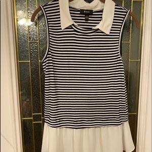 Sophisticated Max Studio women’s sleeveless top, black & white, w/ flouncy hem.